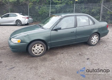 2000 Toyota Corolla Le from USA, damaged, VIN 2T1BR12E2YC309516